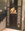 Old iron elevator featuring the nautical logo for the property