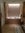 The luxurious bathroom, including a deep, recessed tub at the far end.