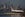 A British Airways airplane waits on the runway with the towers and buildings of the Canary Wharf financial district in background before taking off at London City Airport in London on October 27, 2017.British Airways parent group IAG forecast on October 27 a 20-percent jump in operating profit this year thanks to rising demand and falling costs. Operating profit before exceptional items, and at current fuel prices and exchange rates, was forecast to hit 3.0 billion euros ($2.7 billion) in 2017, IAG said in an statement. That was up from 2.5 billion euros in 2016. / AFP PHOTO / Daniel LEAL-OLIVAS (Photo credit should read DANIEL LEAL-OLIVAS/AFP/Getty Images)