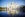 Front view with reflection of Karlskirche (St. Charles's Church) in Vienna on day with long exposure.