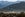 GARMISCH-PARTENKIRCHEN, GERMANY - DECEMBER 28: Patches of man-made snow cover the slopes of Garmisch Classic Ski area on a sunny day with temperatures of up to nine degrees Celsius in the German Alps on December 28, 2015 near Garmisch-Partenkirchen, Germany. Temperatures across Europe remain unseasonably high and many ski resorts at lower altitudes are facing a shortened ski season, if any season at all. (Photo by Philipp Guelland/Getty Images)
