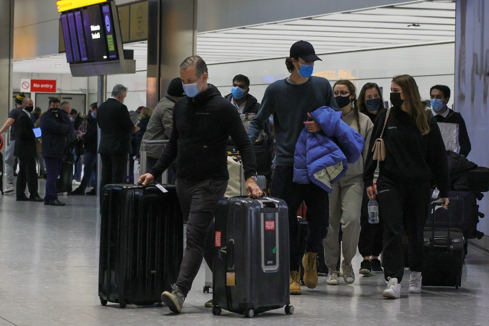 Passengers with bags at airport