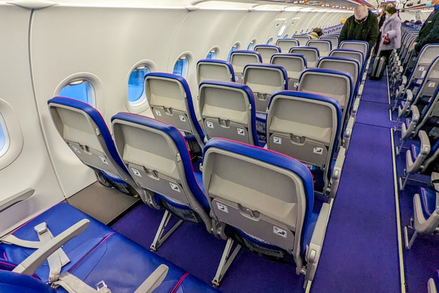 I flew Wizz Air all the way from London to Abu Dhabi - here's why I ...