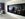 The TV and mini bar are of the room