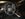 The car's steering wheel, control panels and interior.