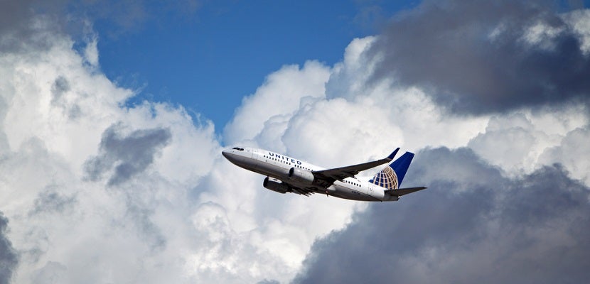 United-airplane-in-air-featured-shutterstock-131071832