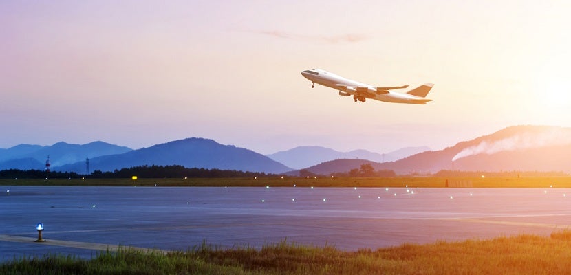 Plane taking off featured shutterstock 157459556