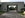 The cobblestone driveway and gate leading to the resort.