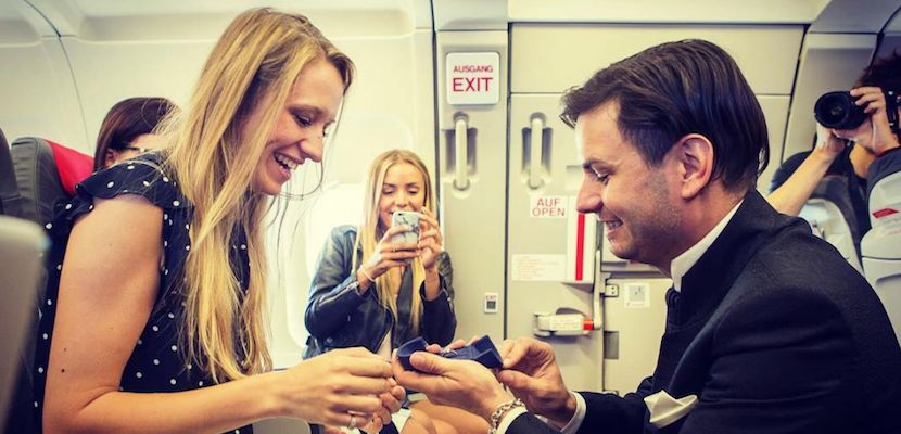 couple-engaged-on-plane.jpg