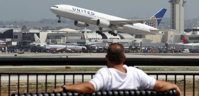 united-takeoff-man-on-bench-feat
