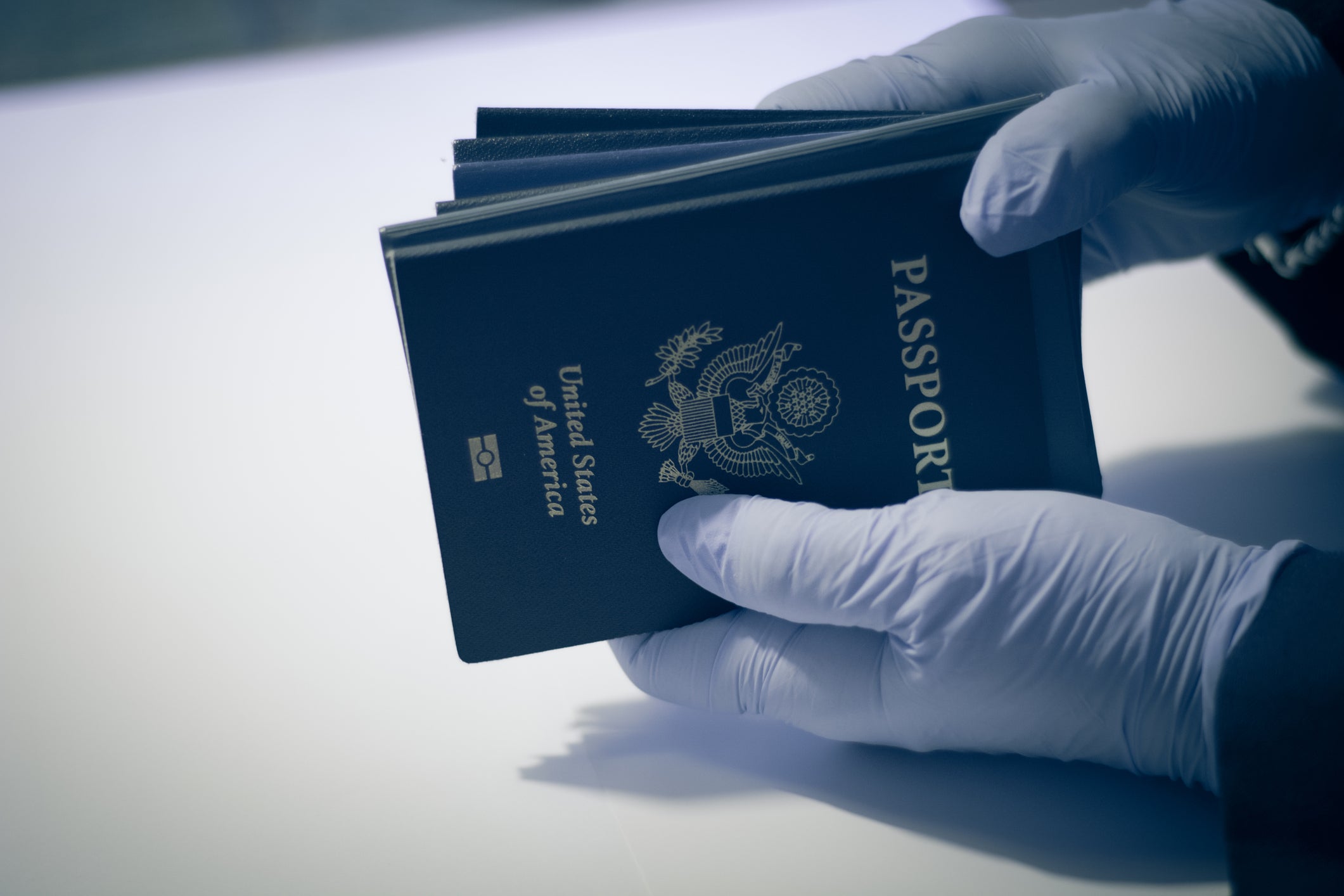 Unrecognizable person, having american passport