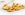 Sev batata puri - fried dough wafers topped with potato and crunchy noodles. Image courtesy of Vm2002 via Getty Images.