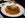 Kathal (or jackfruit biryani) eaten with a side of yogurt. Image courtesy of My Annoying Opinions via Getty Images.