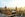 An aerial view of the Houses of Parliament and Big Ben with the city of London stretching behind them. Image courtesy of Samuele Seguso via Getty Images.