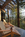 The deck has custom wooden seating for two. Image courtesy of Kodiak Greenwood.