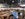 A replica plane hangs over the food hall, seating and historic displays at The Proud Bird