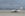 Planes land on the beach runway at Barra Airport. Image by Sue Jackson / Wikipedia Commons.
