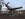 An aircraft replica honoring the Tuskegee Airmen welcomes passengers to The Proud Bird.