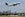 A JetBlue Airbus A320 taking off from FLL with the city of Fort Lauderdale in the background, July 2017 (Image by Alberto Riva / The Points Guy)