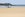 Image of an airplane landing at Barra Airport, Scotland, by marcomanzini/Getty Images.