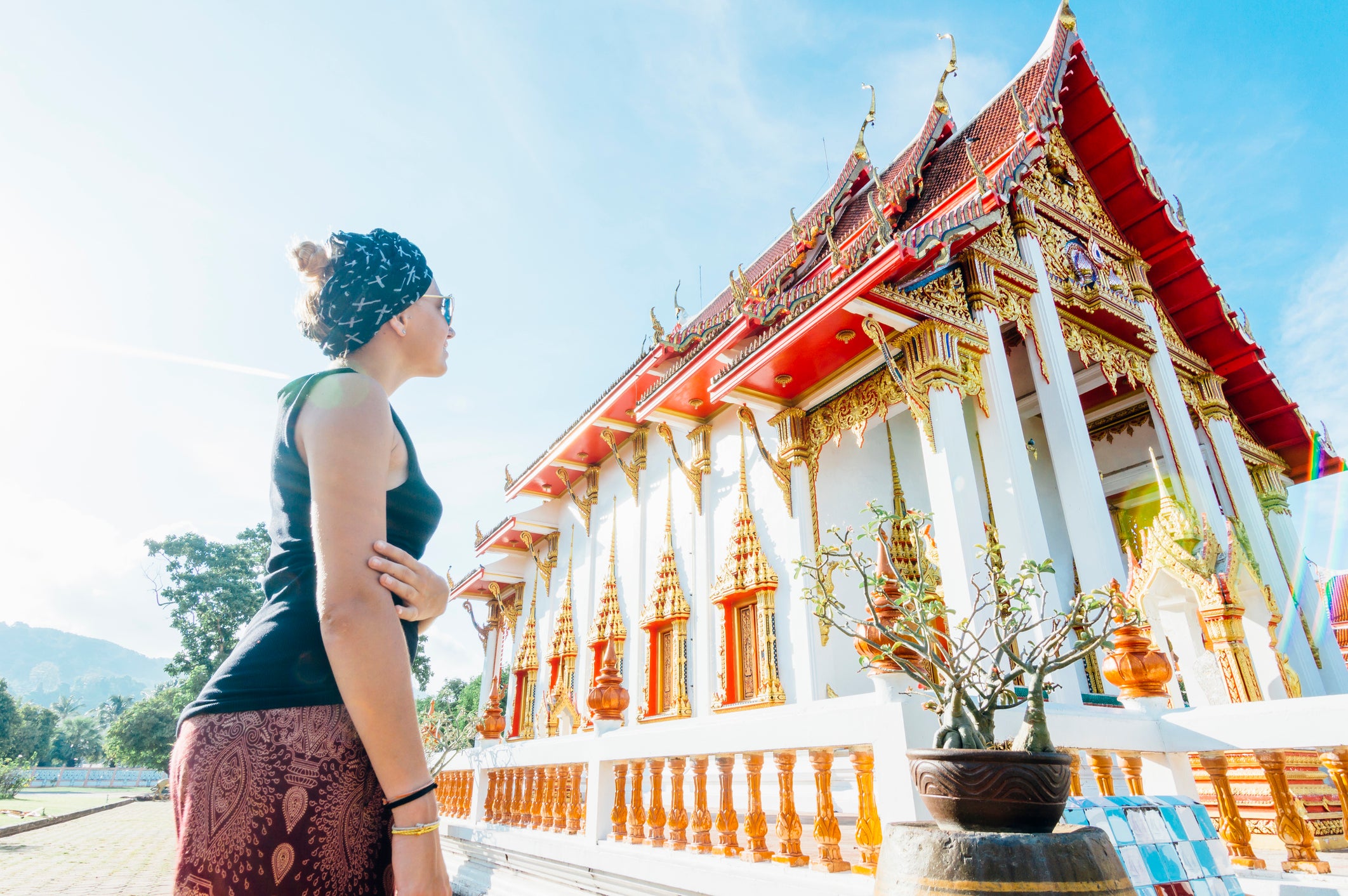 Young woman discovers Thai temple