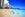 North America, USA, Hawaii, Oahu, Honolulu, Chinatown, People enjoying on Waikiki Beach with skyscraper in background. (Photo by: JTB Photo/UIG via Getty Images)