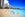 North America, USA, Hawaii, Oahu, Honolulu, Chinatown, People enjoying on Waikiki Beach with skyscraper in background. (Photo by: JTB Photo/UIG via Getty Images)