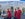 Norwegian CEO Bjørn Kjos (in sunglasses) helps load the 787 in Copenhagen (Image by Angelina Aucello)