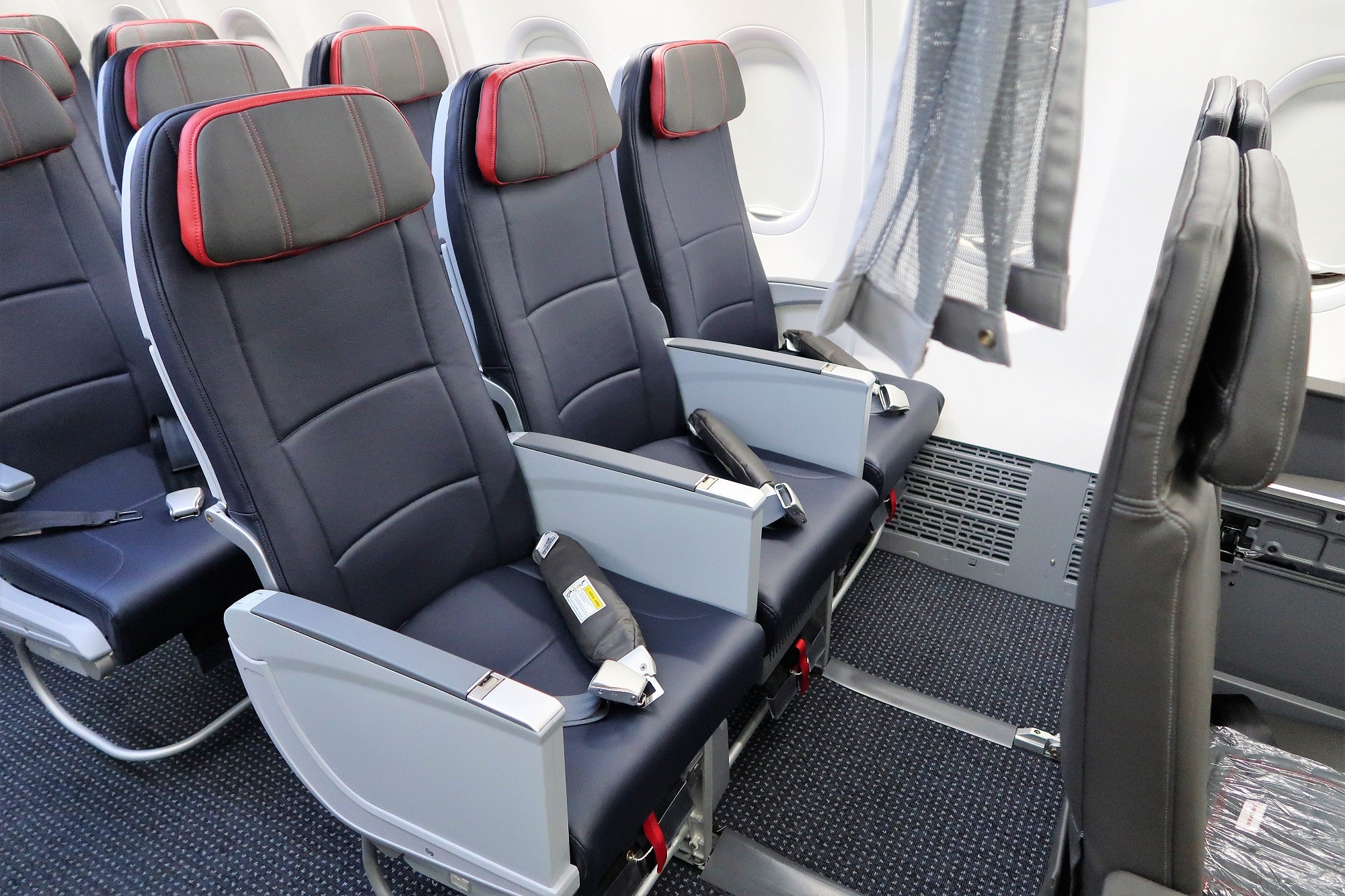 aa-lets-passengers-self-upgrade-to-main-cabin-extra-for-free-the