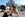 LAKE BUENA VISTA, FL - JUNE 24: In this handout photo provided by Disney Parks, singer Ariana Grande gives Mickey Mouse a kiss in front of Cinderella Castle in the Magic Kingdom June 24, 2014 in Lake Buena Vista, Florida. Grande is celebrating her 21st birthday with dozens of family and friends at Walt Disney World. (Photo by Chloe Rice/Disney Parks via Getty Images)