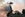 A helicopter makes a water drop over the Creek Fire in Los Angeles, California on December 5, 2017. The raging fire fueled by strong Santa Ana winds has burned more than 11,000 acres and caused the evacuation of 115,000 residents. (Photo by: Ronen Tivony) (Photo by Ronen Tivony/NurPhoto via Getty Images)