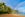 Seascape with rainbow and palm tree at tunnels beach, haena, Kauai, Hawaii.