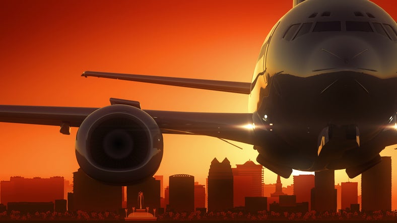 close-up image of plane at sunrise