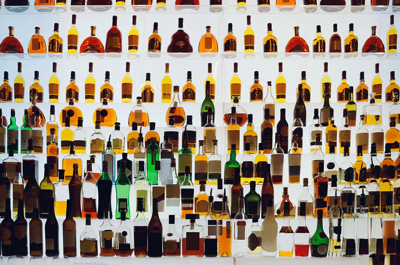 Various alcohol bottles in a bar