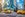 Blurred motion of yellow taxis on busy city street. View of Chrysler Building and modern skyscrapers in New York City. (Photo by xavierarnau)