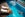 Woman floating on inflatable ring in luxury swimming pool