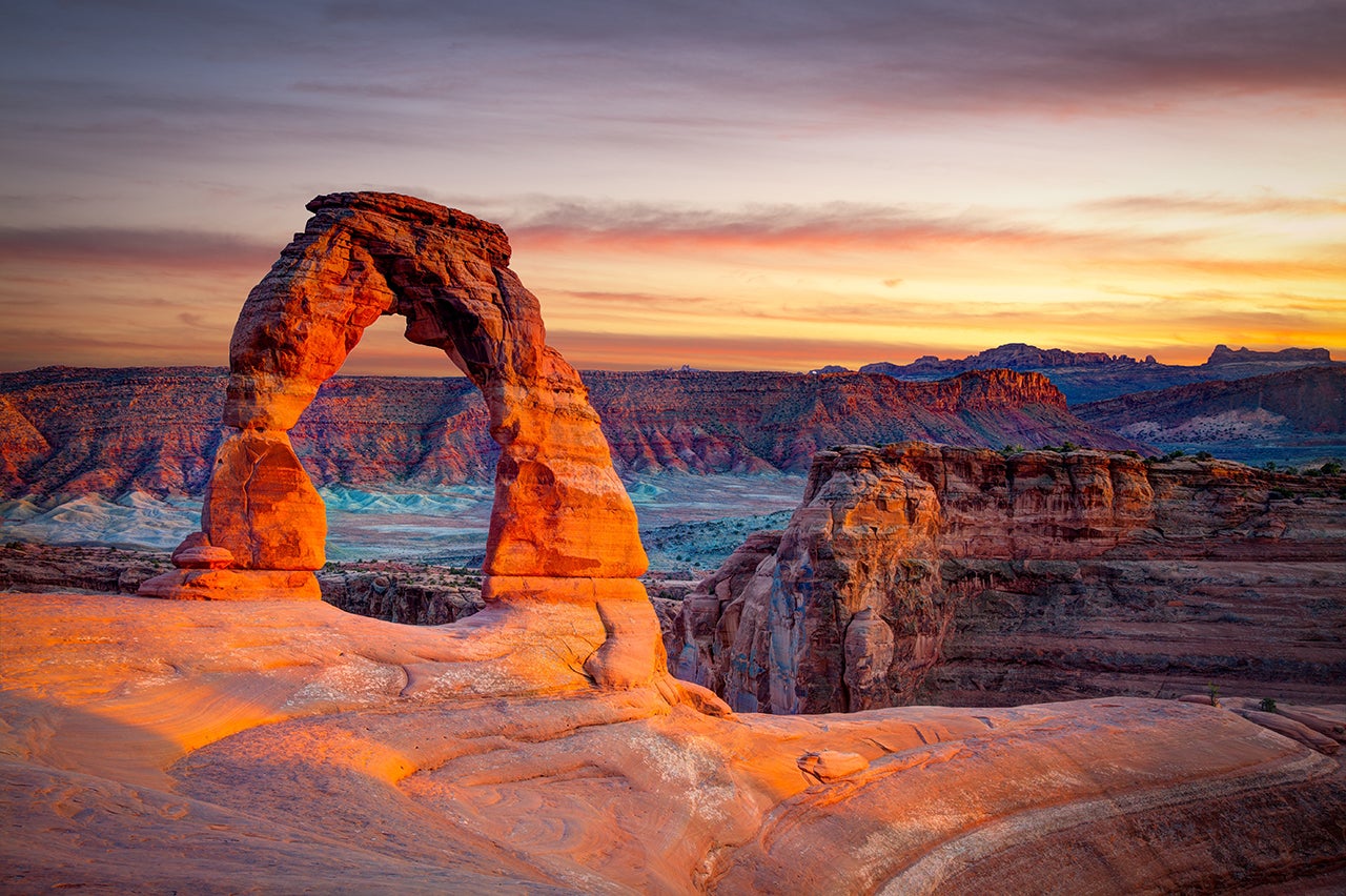 Visiting A National Park This Summer Might Mean Getting Up Before   Delicate Arch Arches National Park UT. 