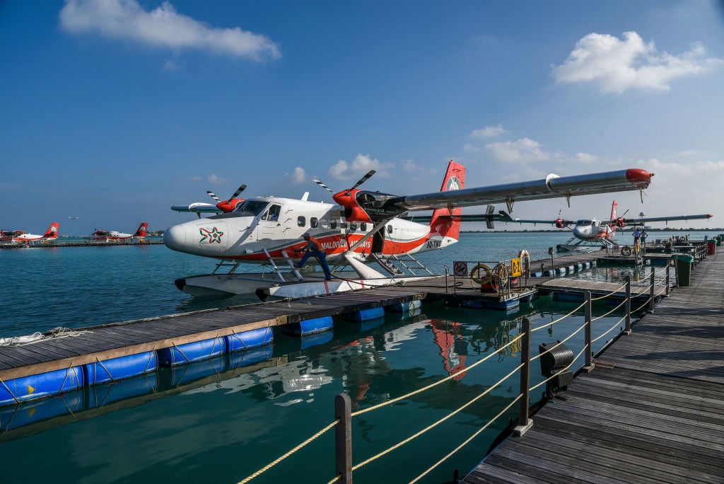 A seaplane undergoes refueling at the Seaplane Terminal at