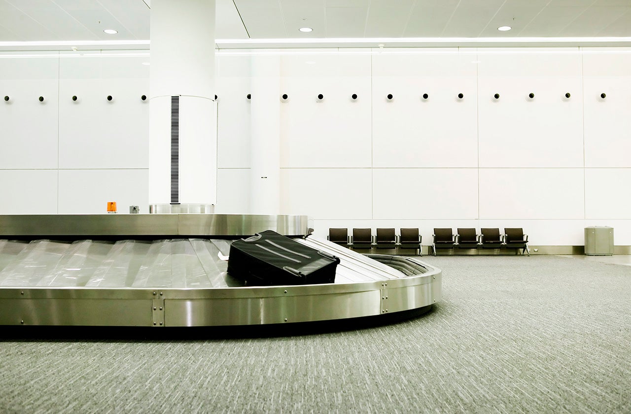 Unclaimed luggage at the airport on the turn style