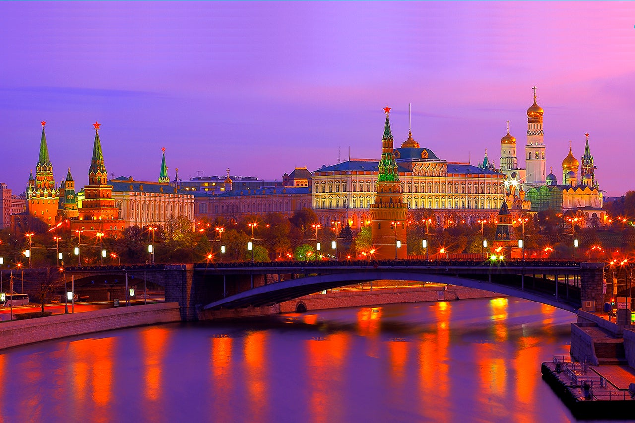 Russian Kremlin, Red Square, dramatic sunrise bright reflection, Moscow