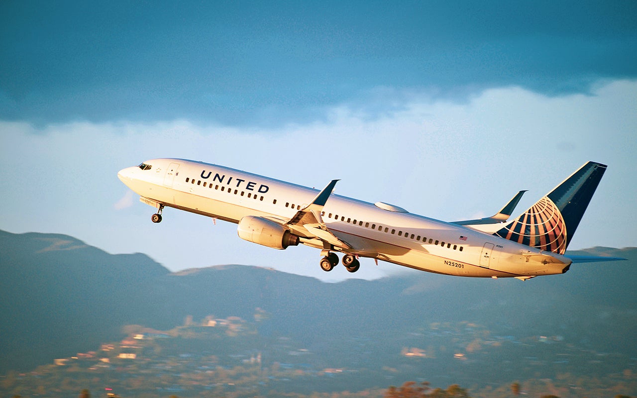 United Airlines Boeing 737-824 aircraft is airborne as it departs Los Angeles International Airport
