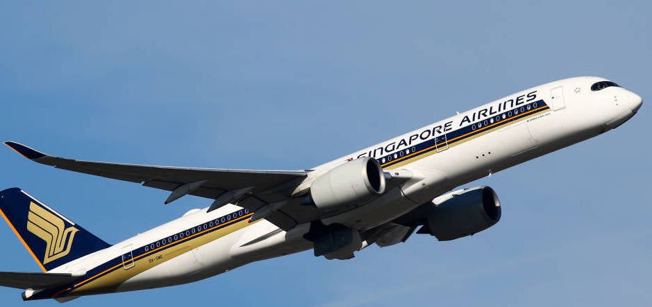 Singapore Airlines Airbus A350-900 climbing out of runway 27