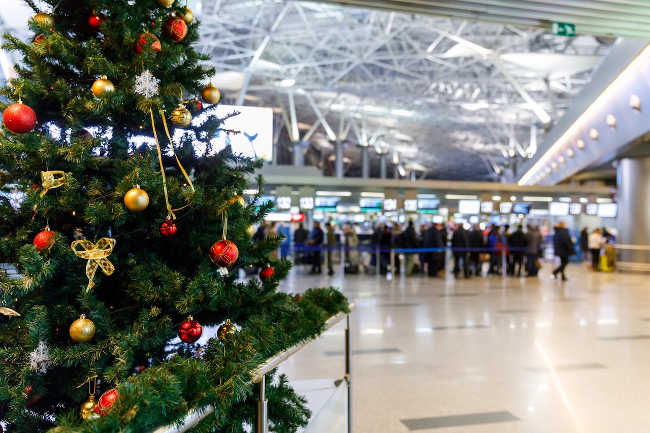 Christmas holidays travelers airport