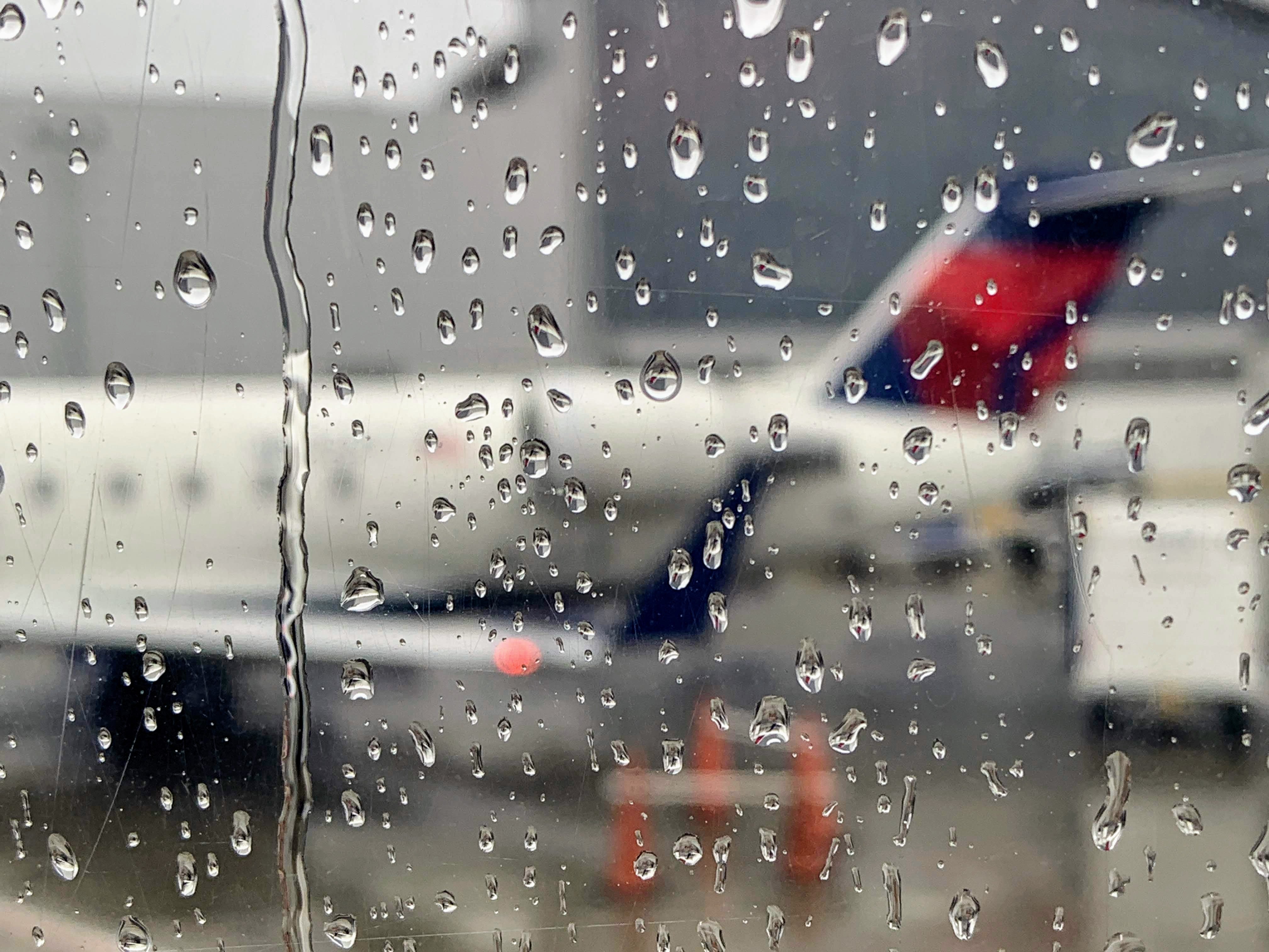 Delta Flight Delay Weather Rain Window