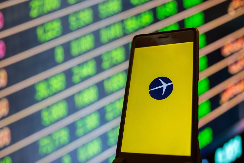 The Expedia app is seen on a smartphone