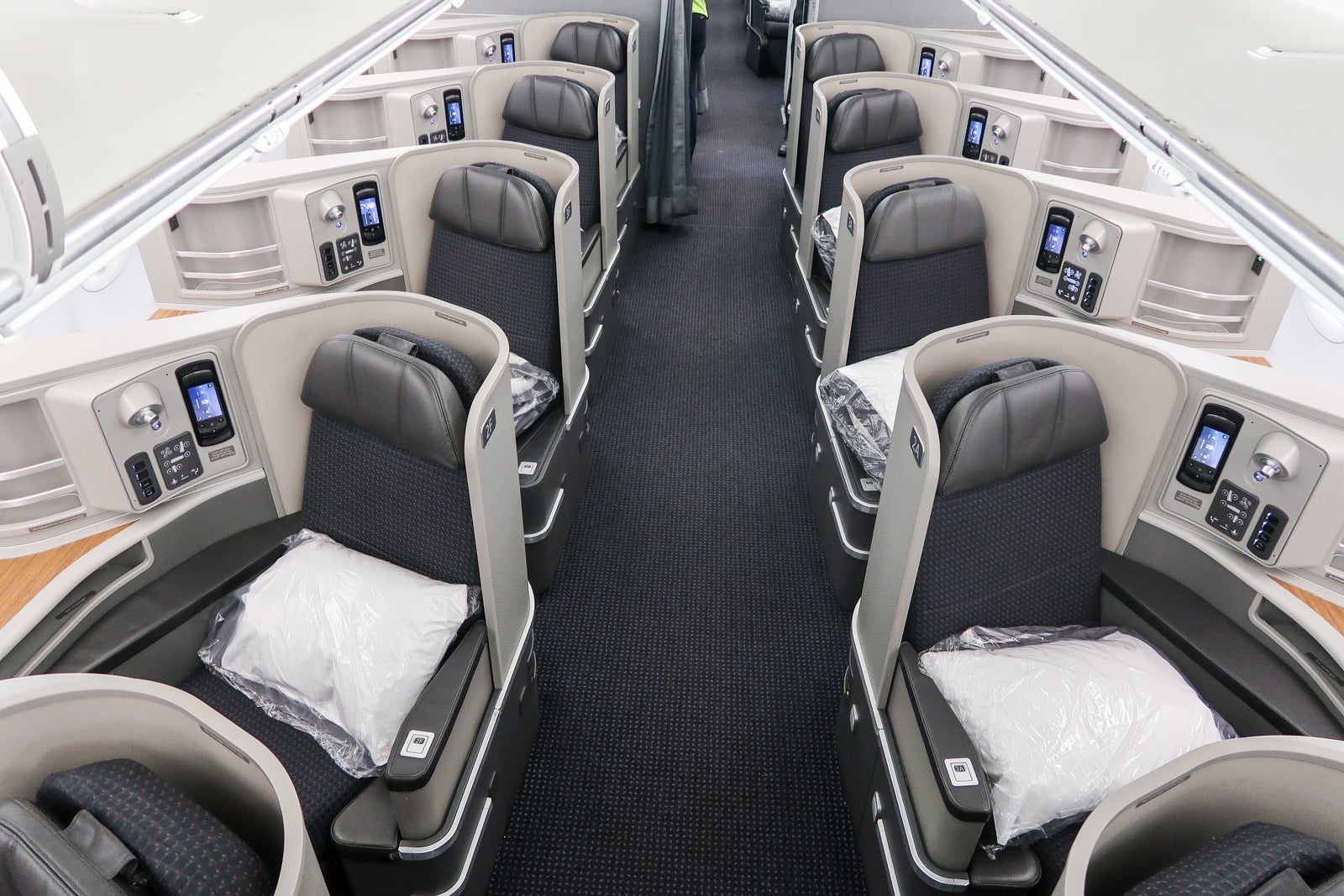 a first class cabin inside an airplane