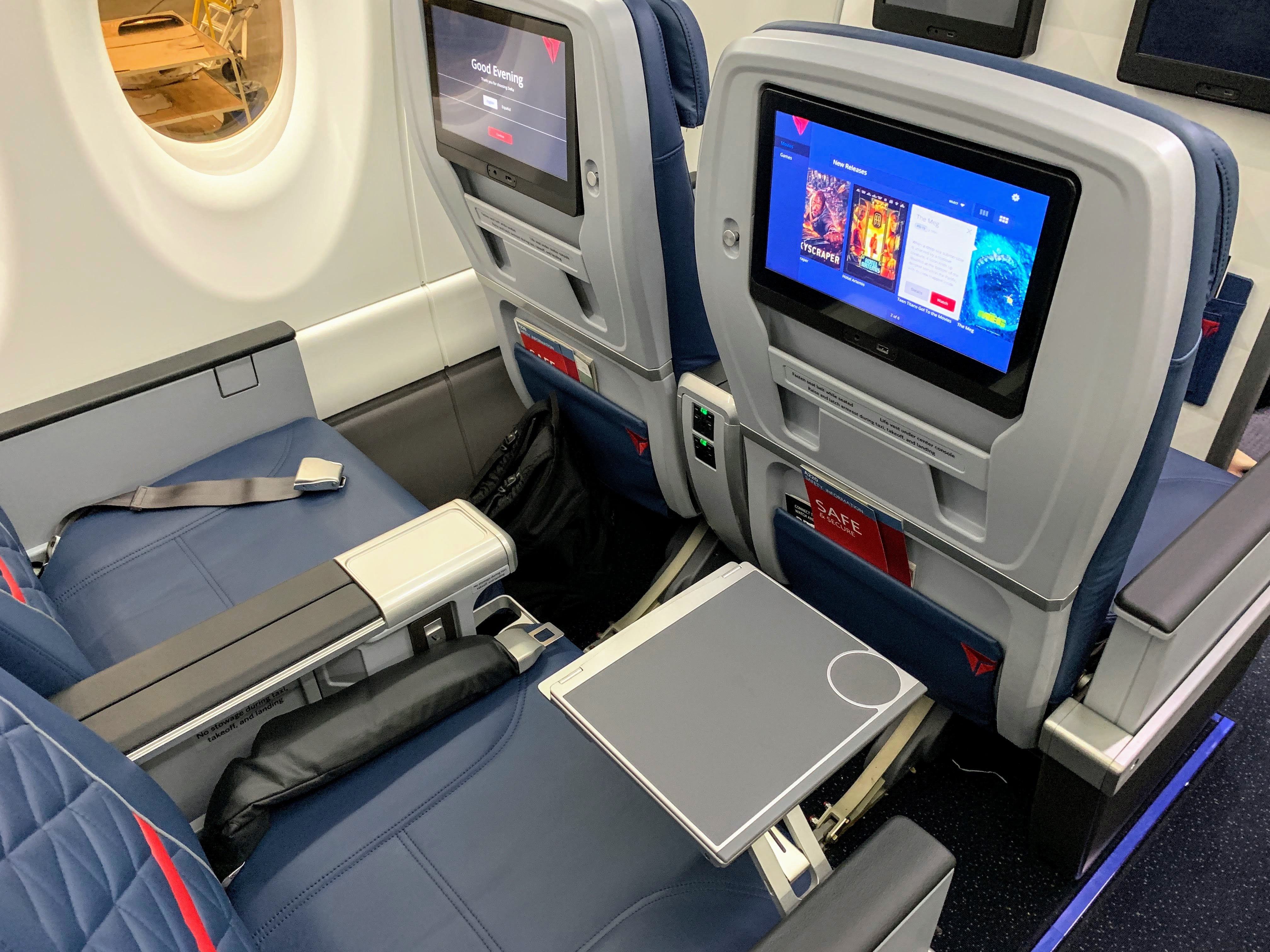 First class seating aboard Delta's A220 (Photo by Darren Murph/The Points Guy)