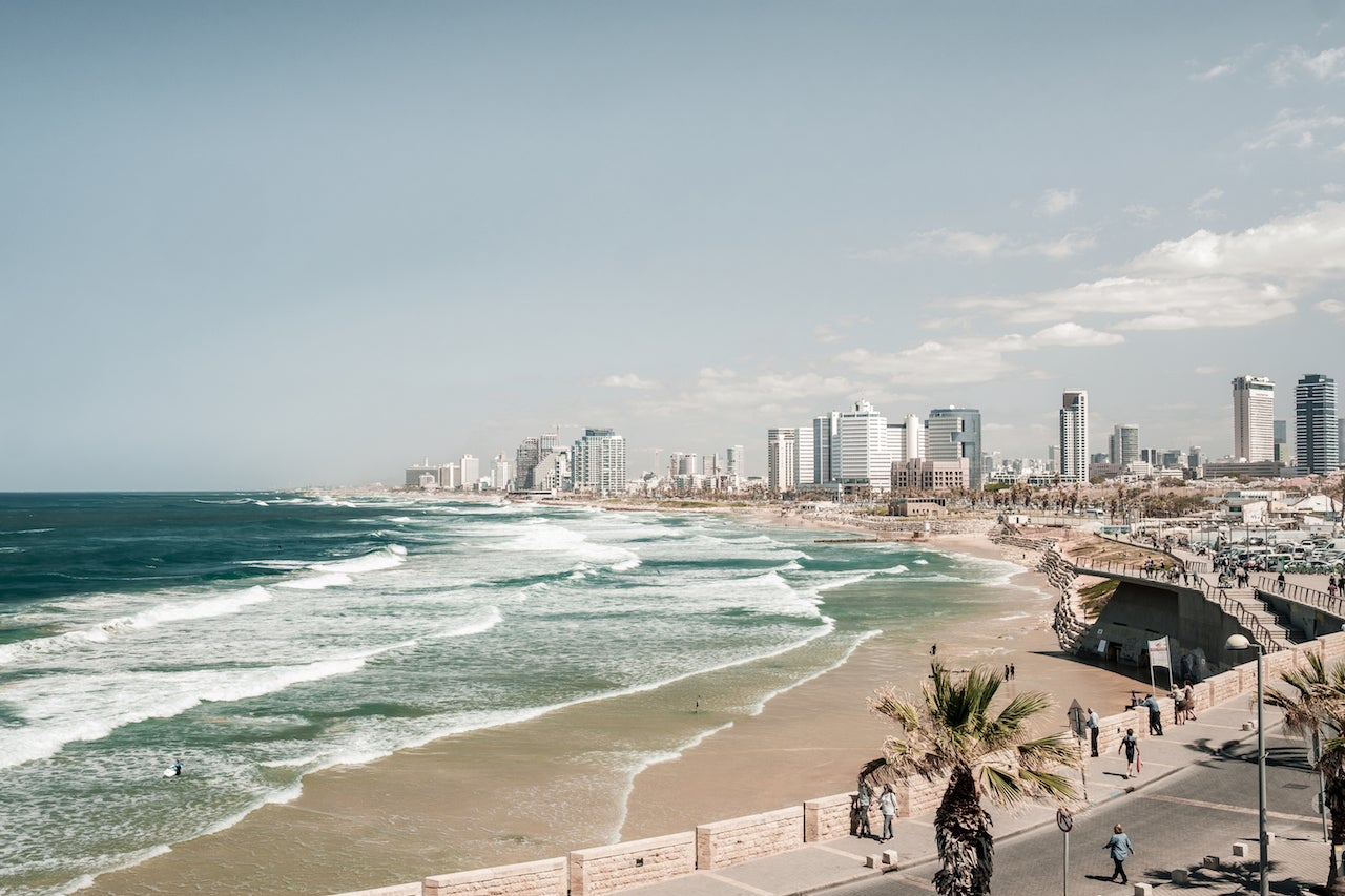 Scenic View Of Sea And Tel Aviv Cityscape Against Clear Sky