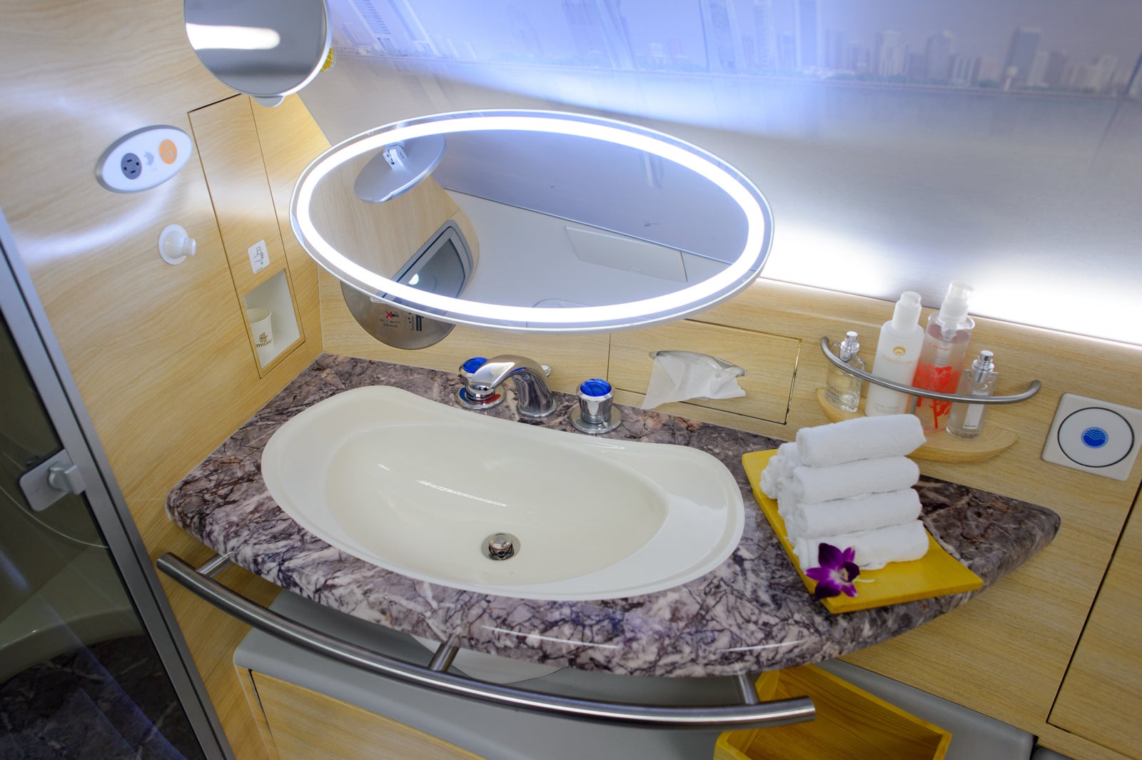 the-coolest-amenities-you-ll-find-in-an-airplane-bathroom-the-points-guy