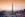 A panoramic view of the Dubai city skyline with the Burj Khalifa shown in the center. The Burj Khalifa is the tallest building in the world. (Image by dblight/Getty Images)